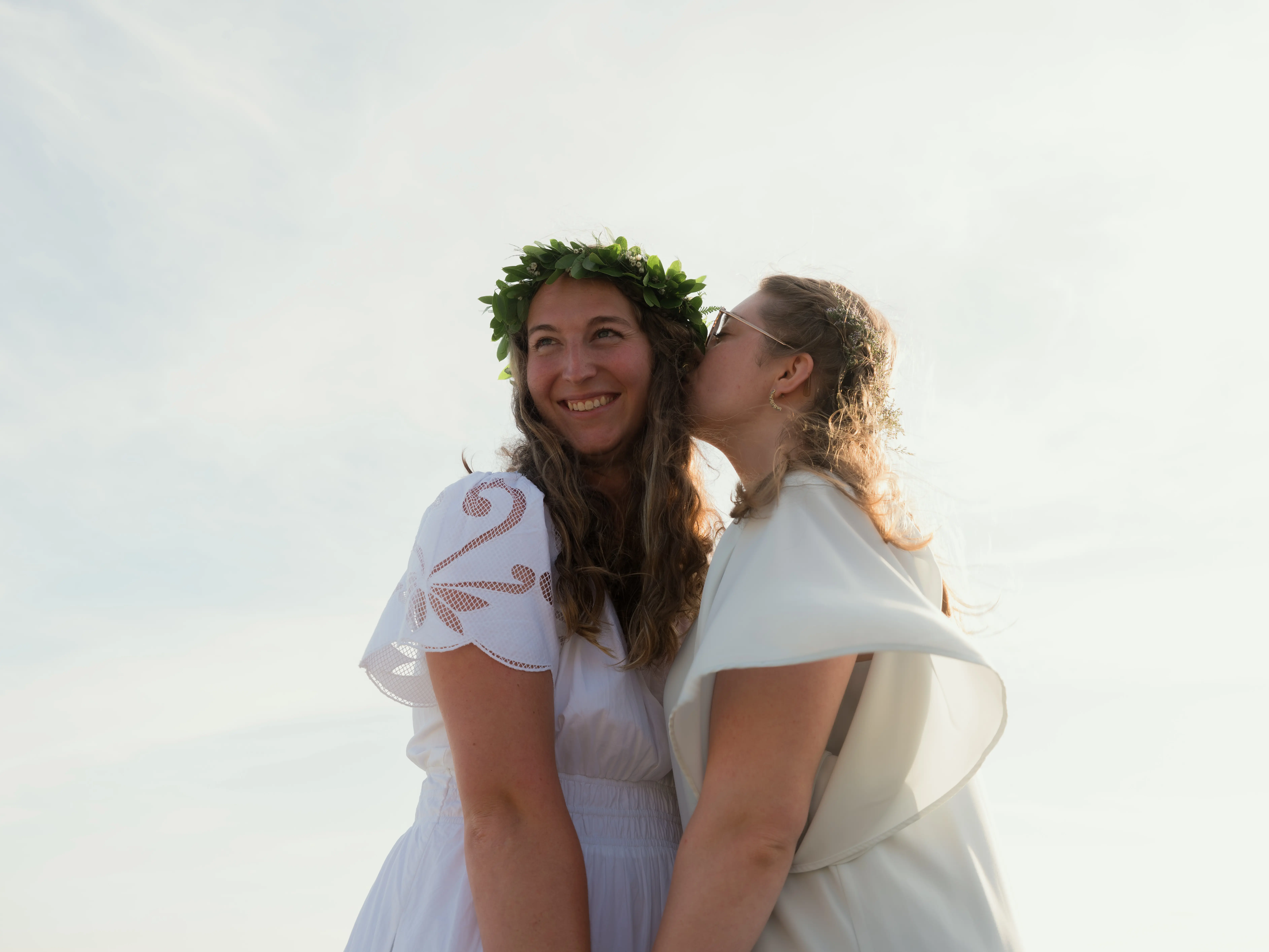 Couple embracing on wedding day